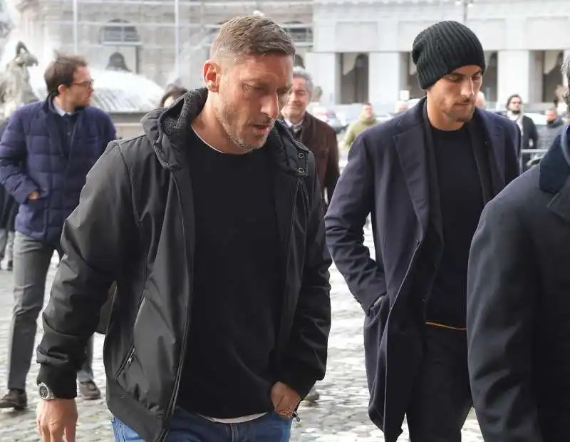 francesco totti e lorenzo pellegrini  foto di bacco