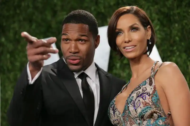 MICHAEL STRAHAN AND NICOLE MURPHY 