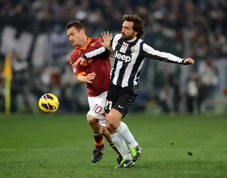 totti vs pirlo foto mezzelani gmt 