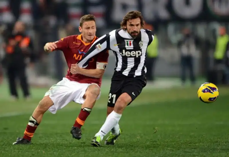 totti vs pirlo foto mezzelani gmt 