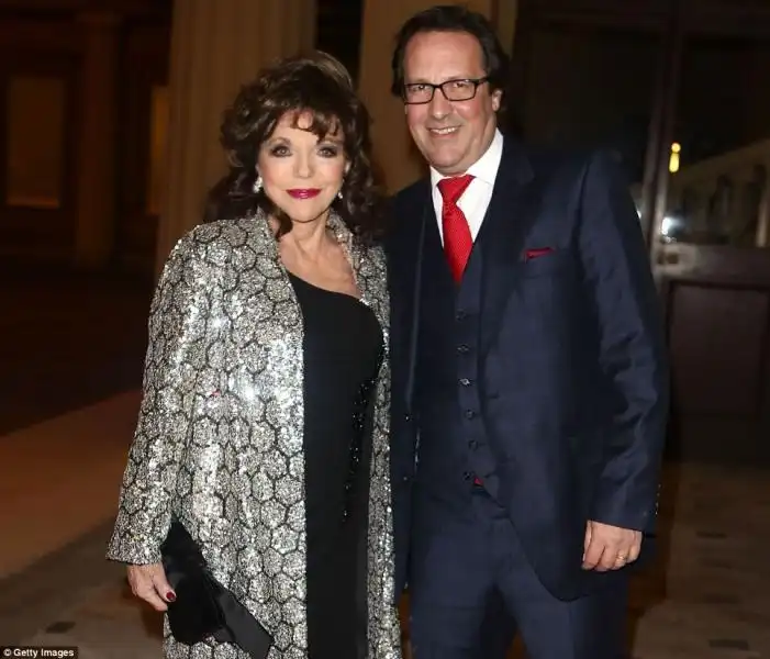 Joan Collins e Percy Gibson 