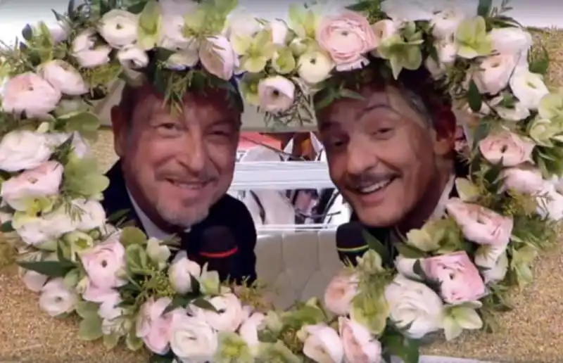 AMADEUS E FIORELLO LASCIANO SANREMO IN CARROZZA