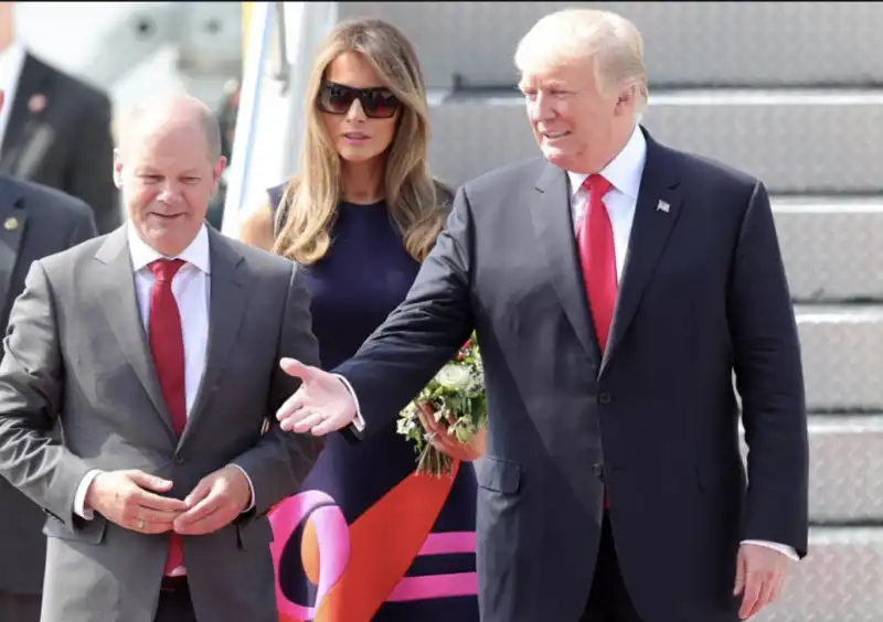 OLAF SCHOLZ DONALD E MELANIA TRUMP