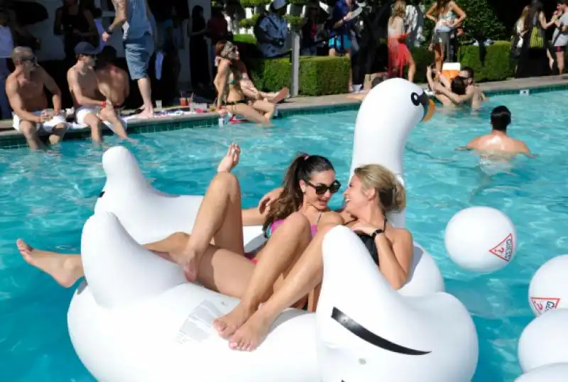 where guests could lounge on swans in the pool 