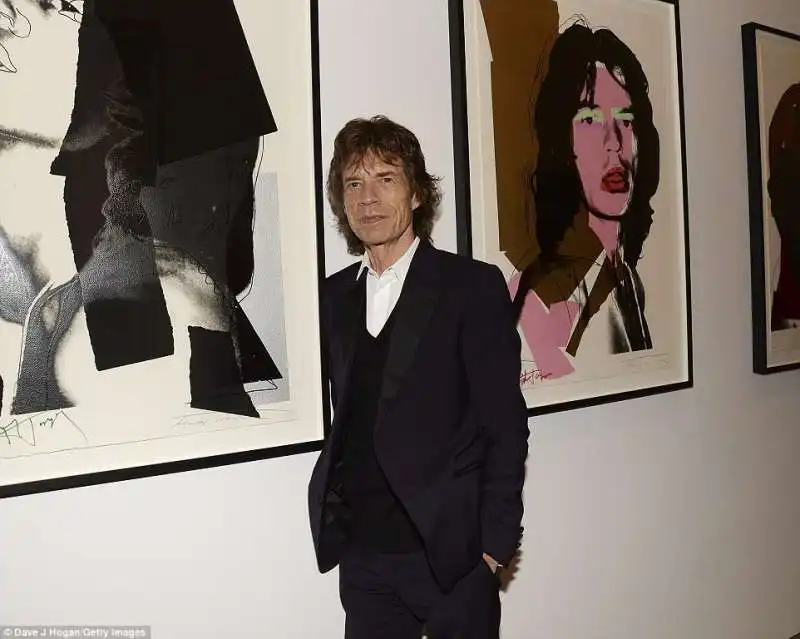 mick accanto ritratti di se stesso di andy warhol