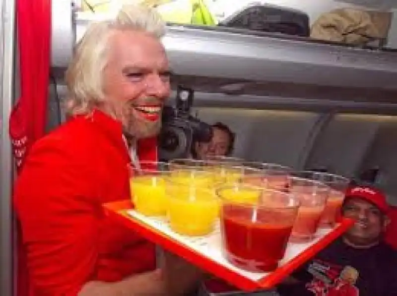 RICHARD BRANSON TRAVESTITO DA HOSTESS CON I SUCCHI jpeg