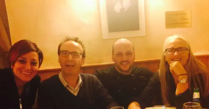 benigni a cena al 59