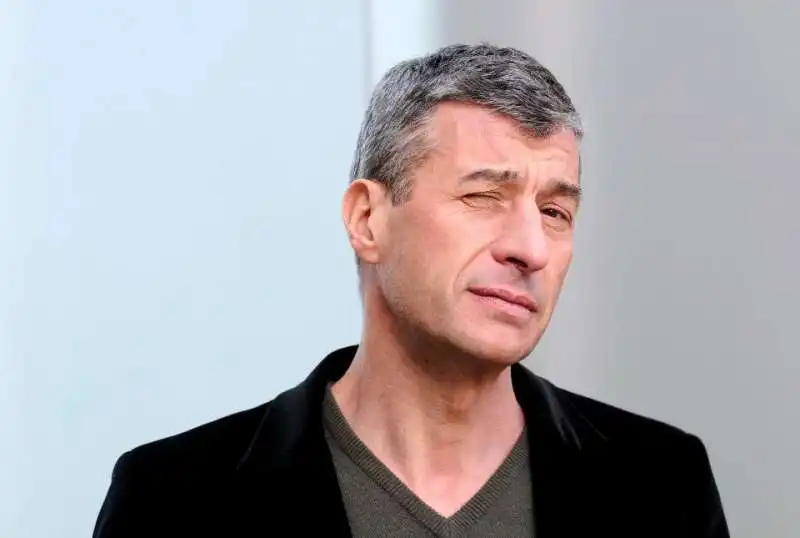 MAURIZIO CATTELAN 