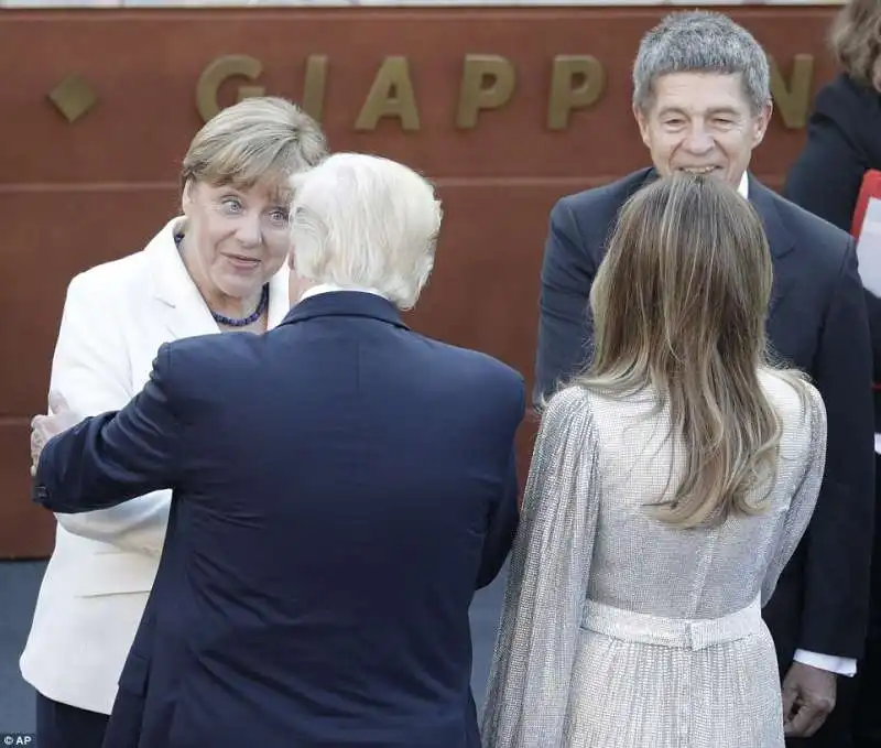 angela merkel e marito con donald e melania trump