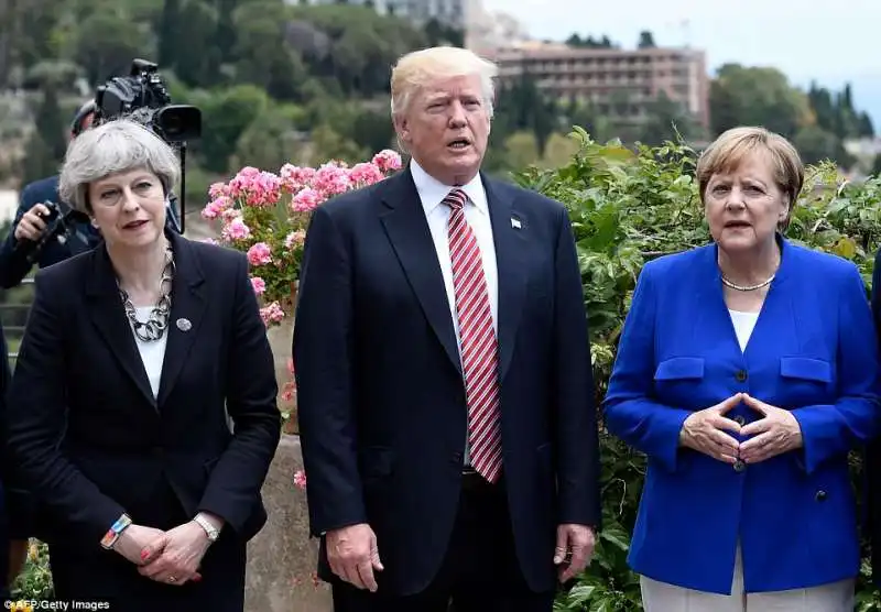 theresa may   donald trump   angela merkel