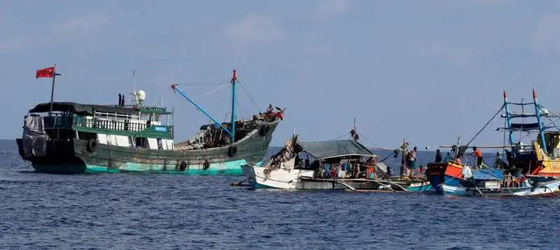 Pescatori cinesi e filippini