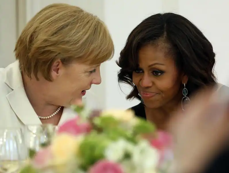 ANGELA MERKEL E MICHELLE OBAMA FOTO LAPRESSE 