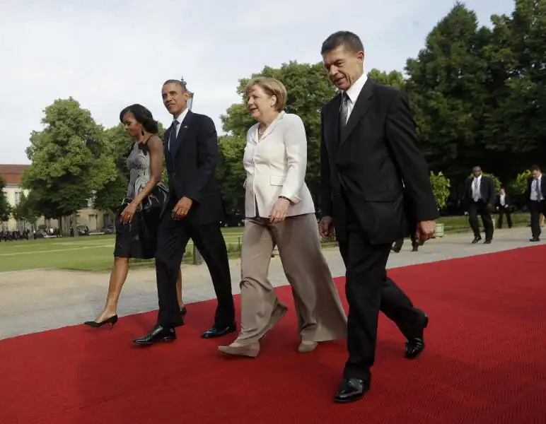 GLI OBAMA ANGELA MERKEL E IL MARITO FOTO LAPRESSE 