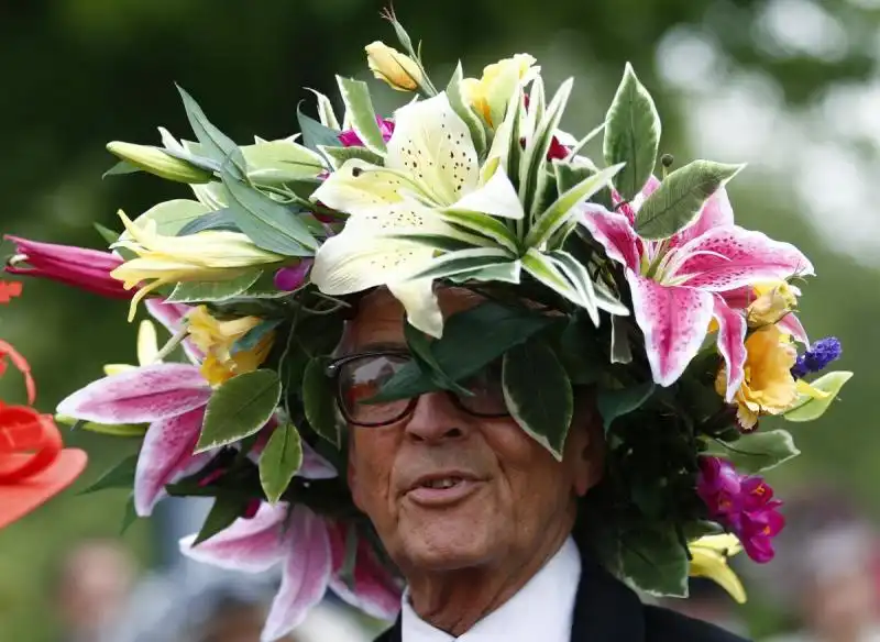 this male spectator rocked a hat made entirely of fresh flowers 