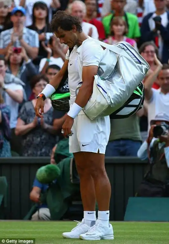 2a2e223b00000578 3147671 rafael nadal looks downbeat after the match m 1 1435869442714