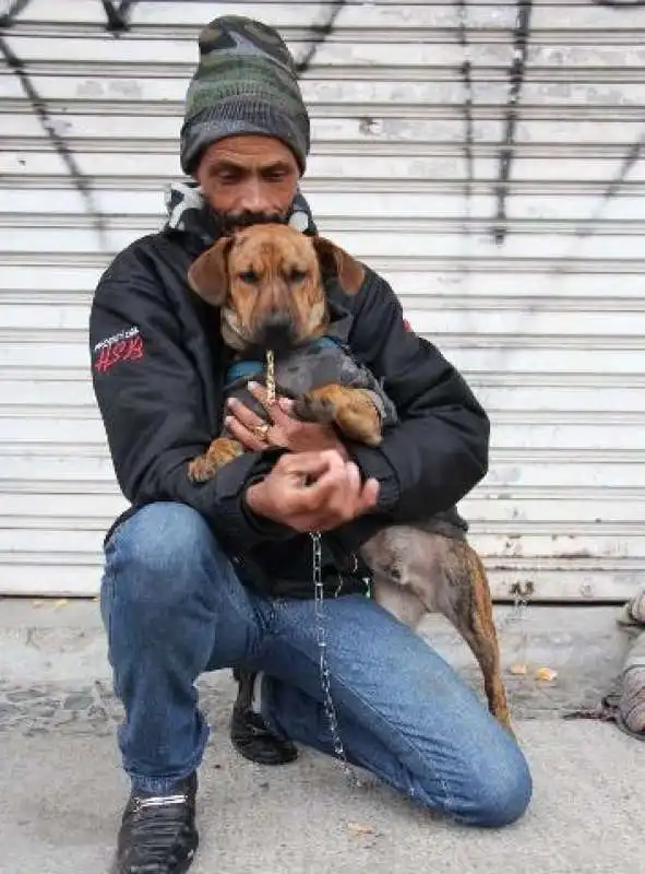 Carlos Merlini Neto con il suo cane  