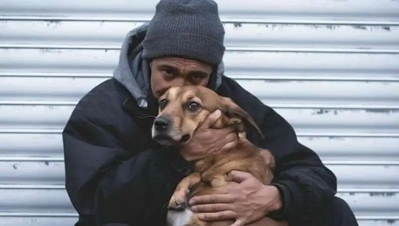 Carlos Merlini Neto con il suo cane  