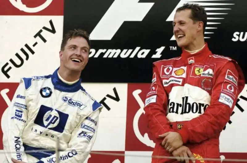 ralf schumacher sul podio con il fratello michael 