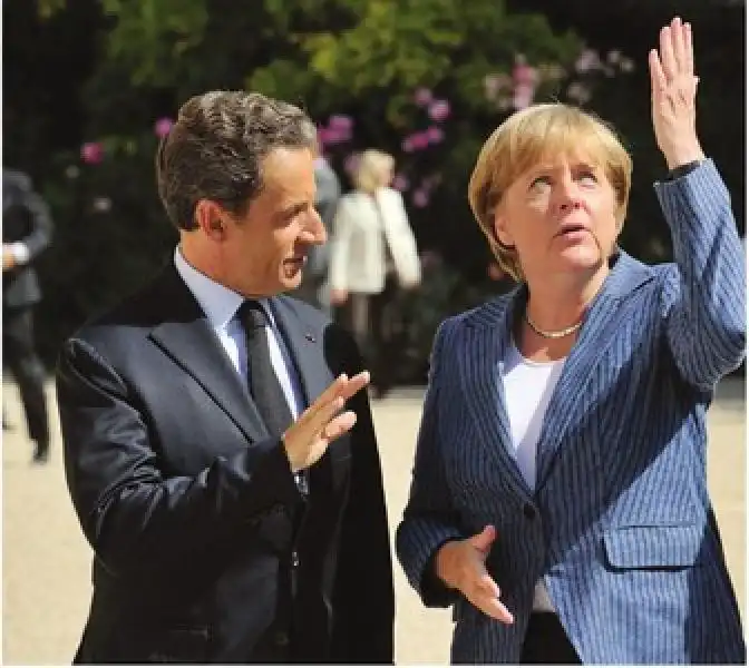 ANGELA MERKEL E NICOLAS SARKOZY