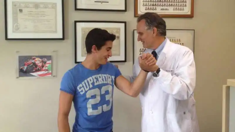 xavier mir con marc marquez  