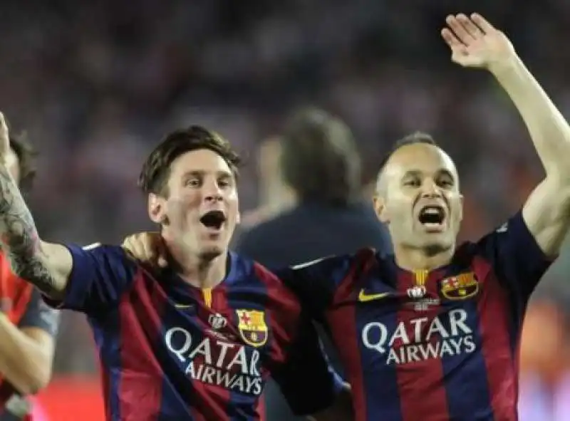 leo messi e andres iniesta