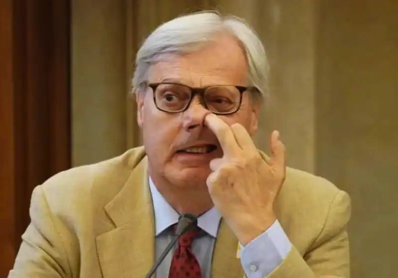 vittorio sgarbi si scaccola