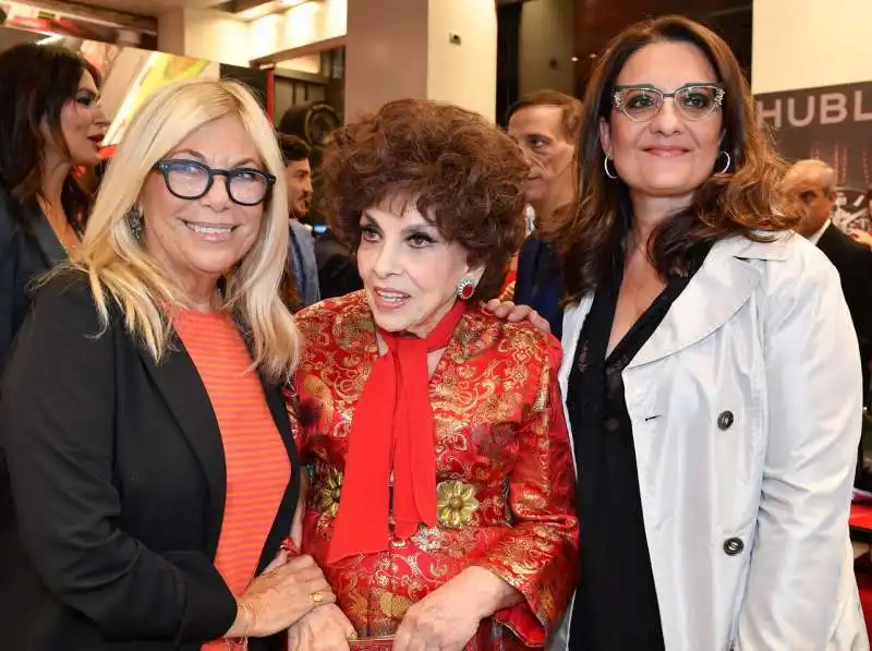 rita dalla chiesa  gina lollobrigida  catena fiorello  foto di bacco