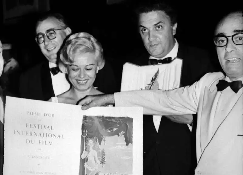 FEDERICO FELLINI E GIULIETTA MASINA CON GIUSEPPE AMATO 