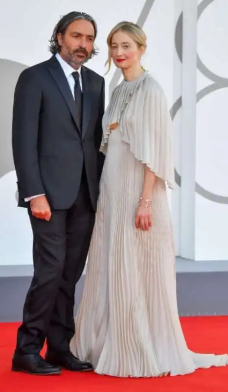 saverio costanzo in brioni e alba rohrwacher in christian dior haute couture