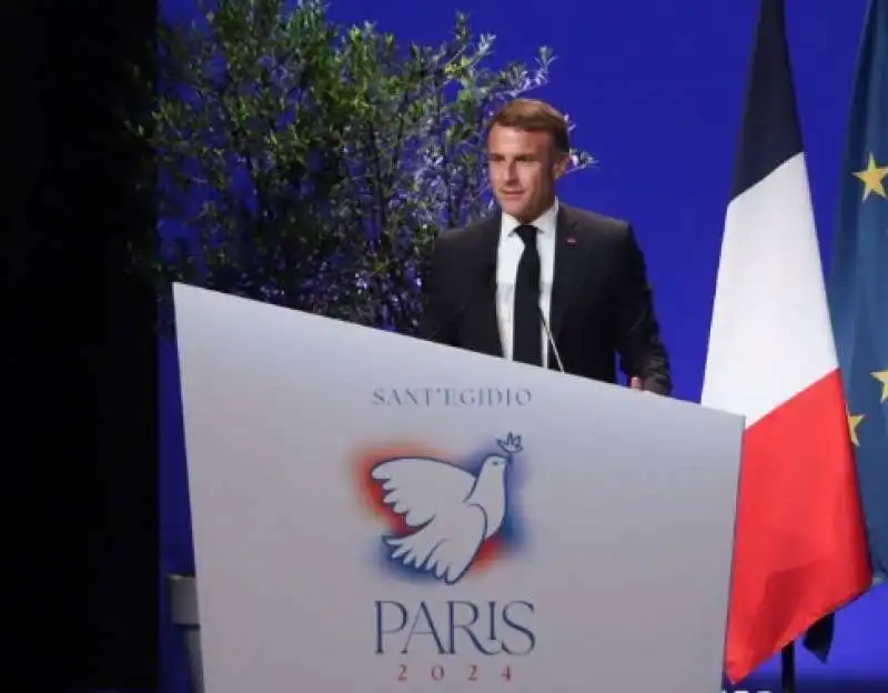 EMMANUEL MACRON AL MEETING PER LA PACE ORGANIZZATO DA SANT EGIDIO A PARIGI