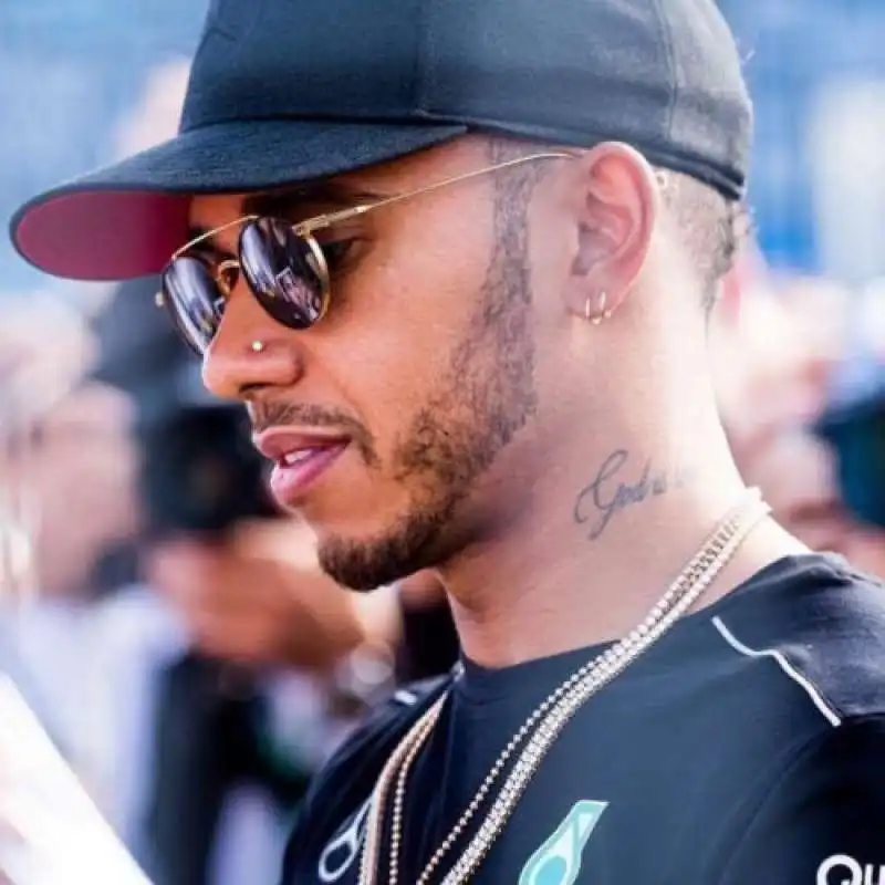 LEWIS HAMILTON PIERCING 