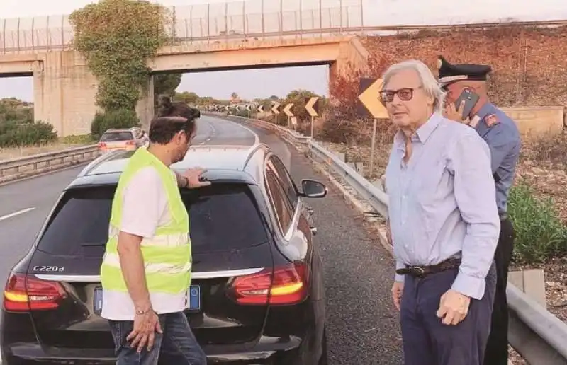 vittorio sgarbi in auto 