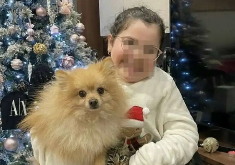 BAMBINA DISABILE CON IL SUO CANE