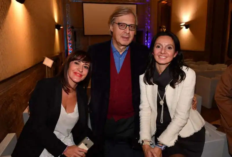 sgarbi con claudia cermelli e arianna zocca