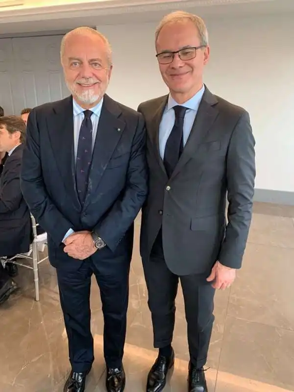 AURELIO DE LAURENTIIS CON LA GIACCA SPORCA E GIORGIO MARCHETTI