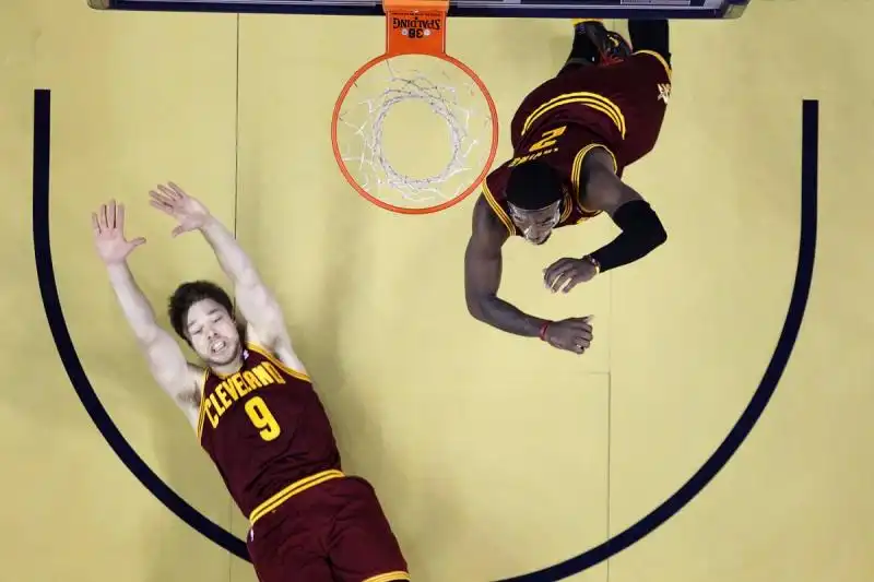 cavaliers players fall on the court during a game in new orleans 