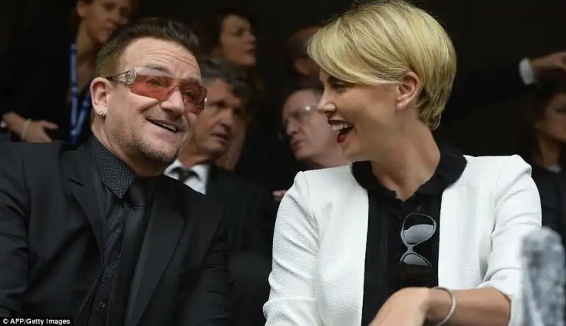 FUNERALI DI NELSON MANDELA - BONO E CHARLIZE THERON