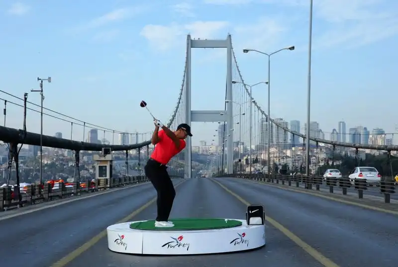 tiger woods hits a shot from asia to europe in turkey 