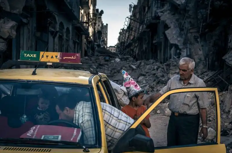 abu hisham abdel karim with his family in the khalidieh district