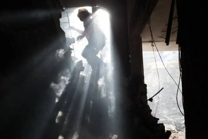 building hit by several israeli bombs