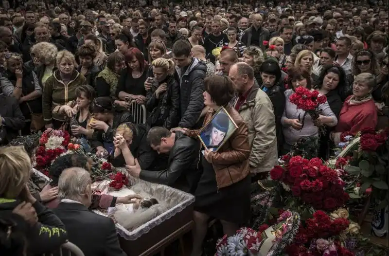 funeral of yulia izotova, 21, who was killed during clashes between ukrainian troops and pro russian separatists