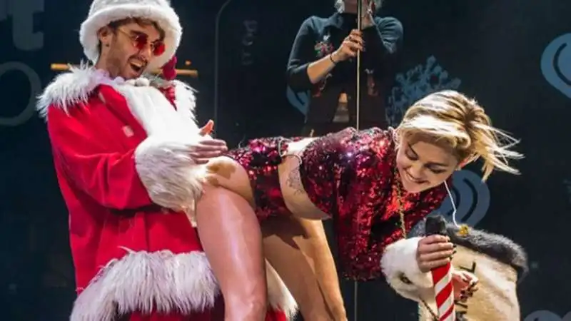 miley cyrus jingle ball twerking santa. photos video