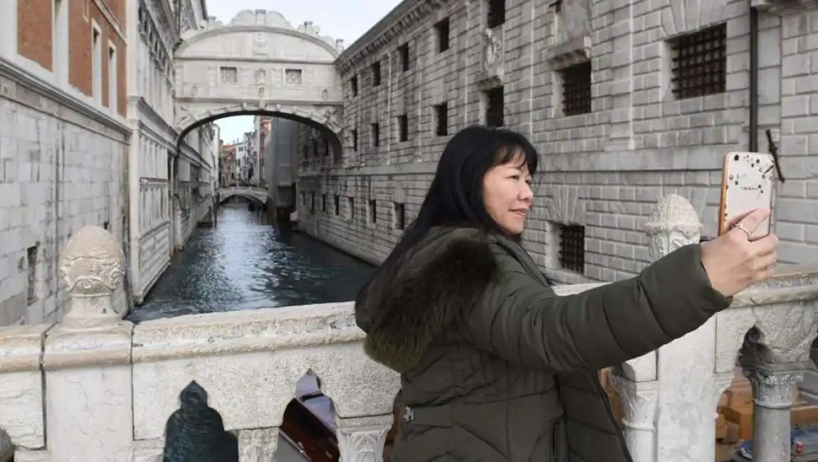 turisti giapponesi venezia