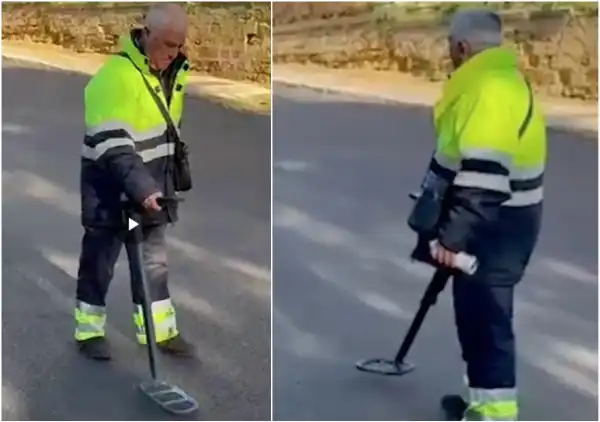 operaio cerca tombino con il metal detector ad agrigento