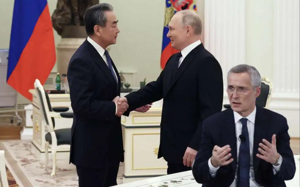 wang yi vladimir putin jens stoltenberg 