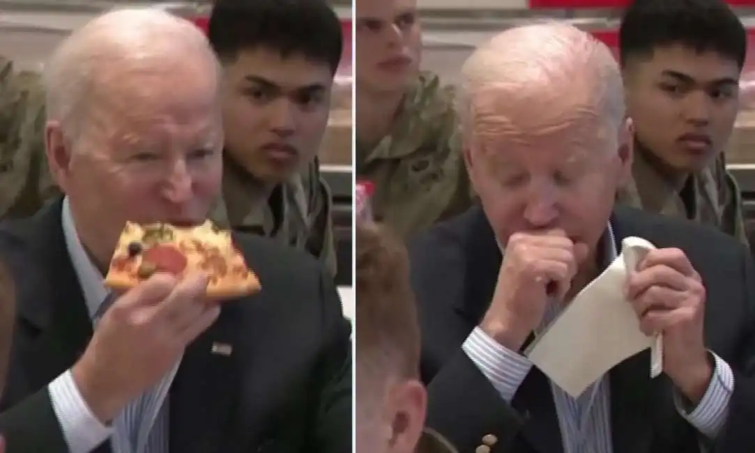 joe biden mangia la pizza con i soldati americani in polonia - 7