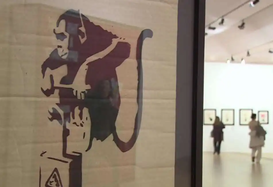 dismaland monkey tnt banksy painting walls al museo m9 di mestre