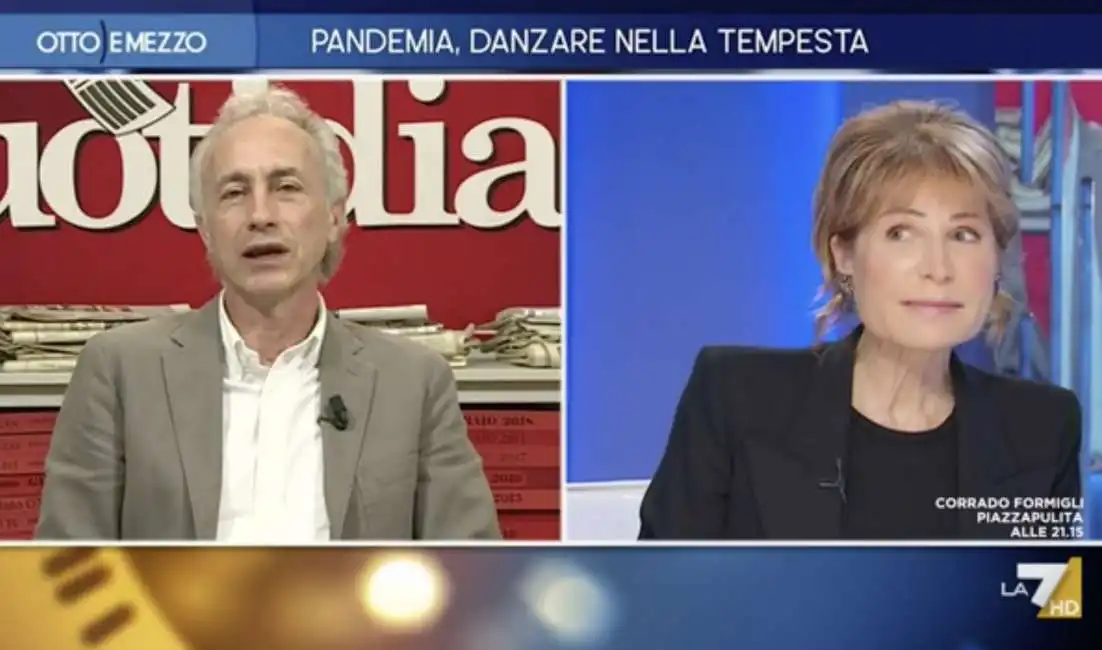 lilli gruber fa le facce mentre parla travaglio otto e mezzo