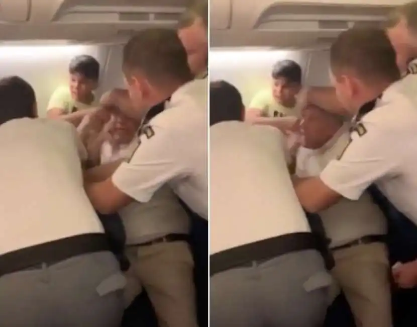 romania - un passeggero egiziano viene trascinato via brutalmente da un aereo