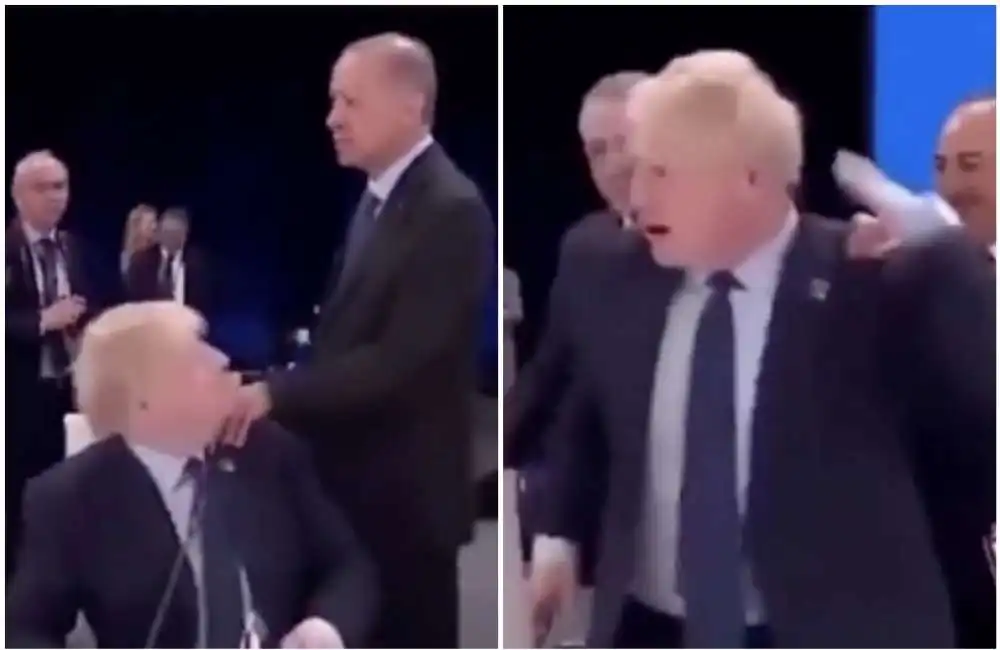 boris johnson toglie la mano di erdogan